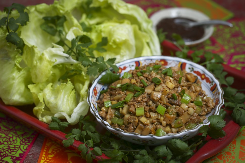Minced dried oysters, pork and vegetables in lettuce cups. Photo: Jonathan Wong