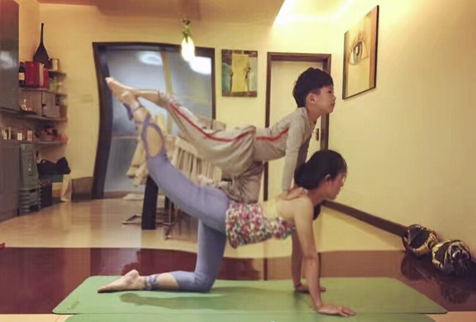Sun and his mother strike a yoga pose together. Photo: Weibo