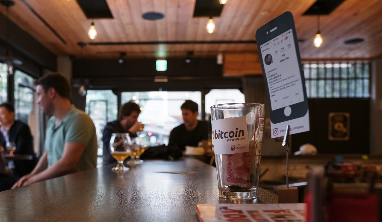 The bitcoin logo is displayed on a tip jar inside the 23 cafe in Taipei, Taiwan, on January 26, 2018. The half a billion dollar theft in Japan on the Coincheck Exchange could be a cautionary tale for Taiwan. Photo: Bloomberg