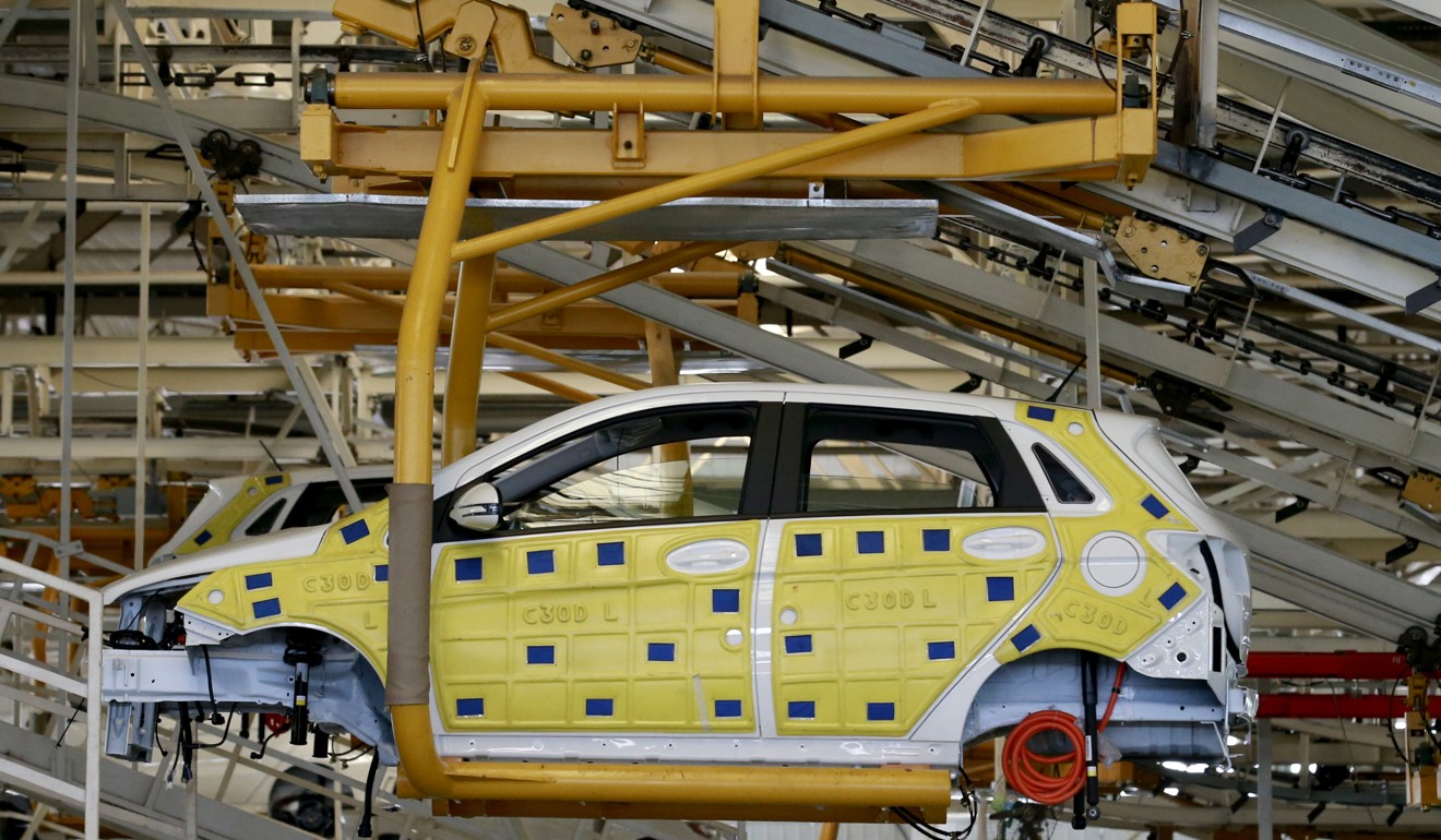 An assembly line producing electric vehicles at a factory of Beijing Electric Vehicle, funded by Beijing Automotive Group (BAIC). The company is one member of the alliance formed by Didi Chuxing to enter the market for electric vehicle rentals. Photo: Reuters