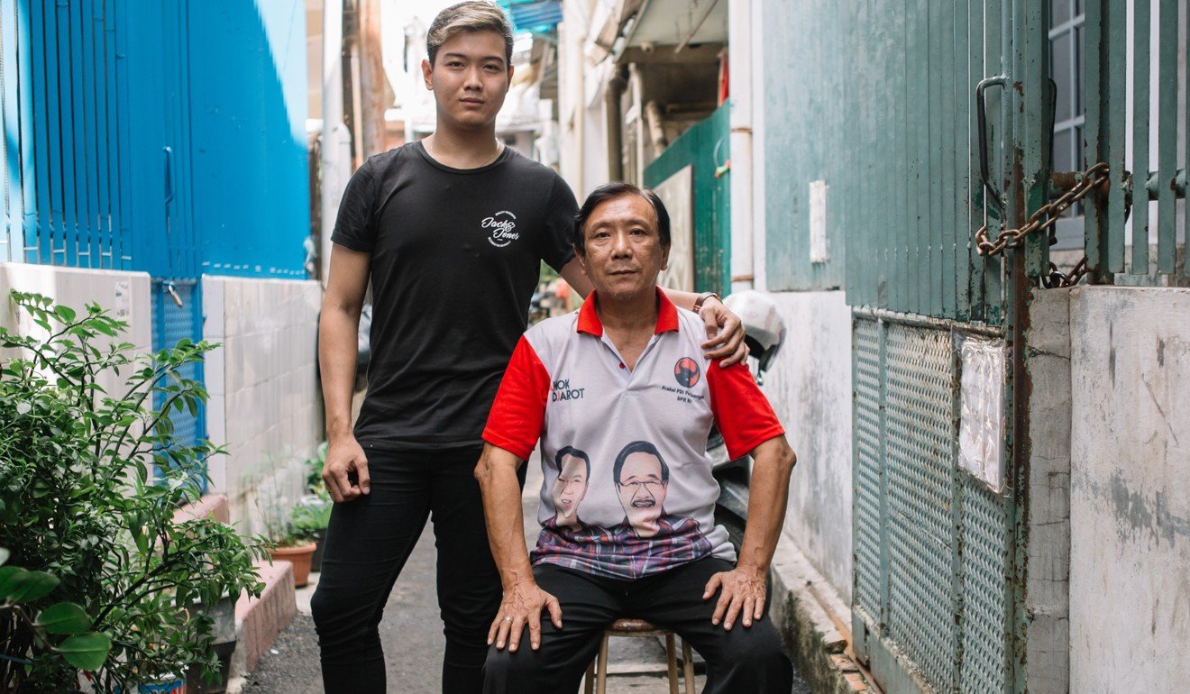 Arifin and his father, Ah Kim, outside their house. Photo: Ceritalah / Muhammad Fadli