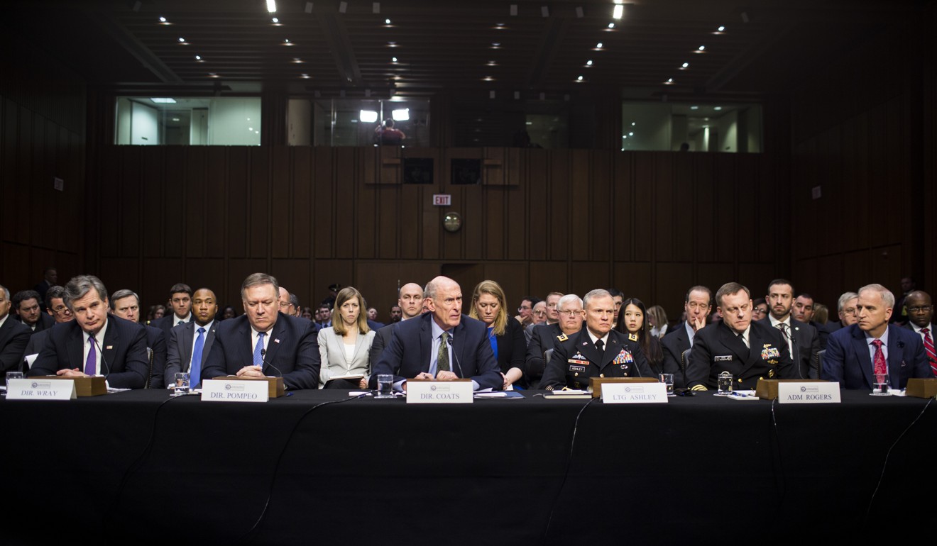 Dan Coats, director of National Intelligence, testifies during a Senate Intelligence Committee hearing on worldwide threats in Washington. Also pictured are Christopher Wray, director of the FBI, Mike Pompeo, director of the CIA, Robert Ashley and Admiral Michael Rogers of the NSA, and Robert Cardillo, director of the National Geospatial-Intelligence Agency. Photo: Bloomberg