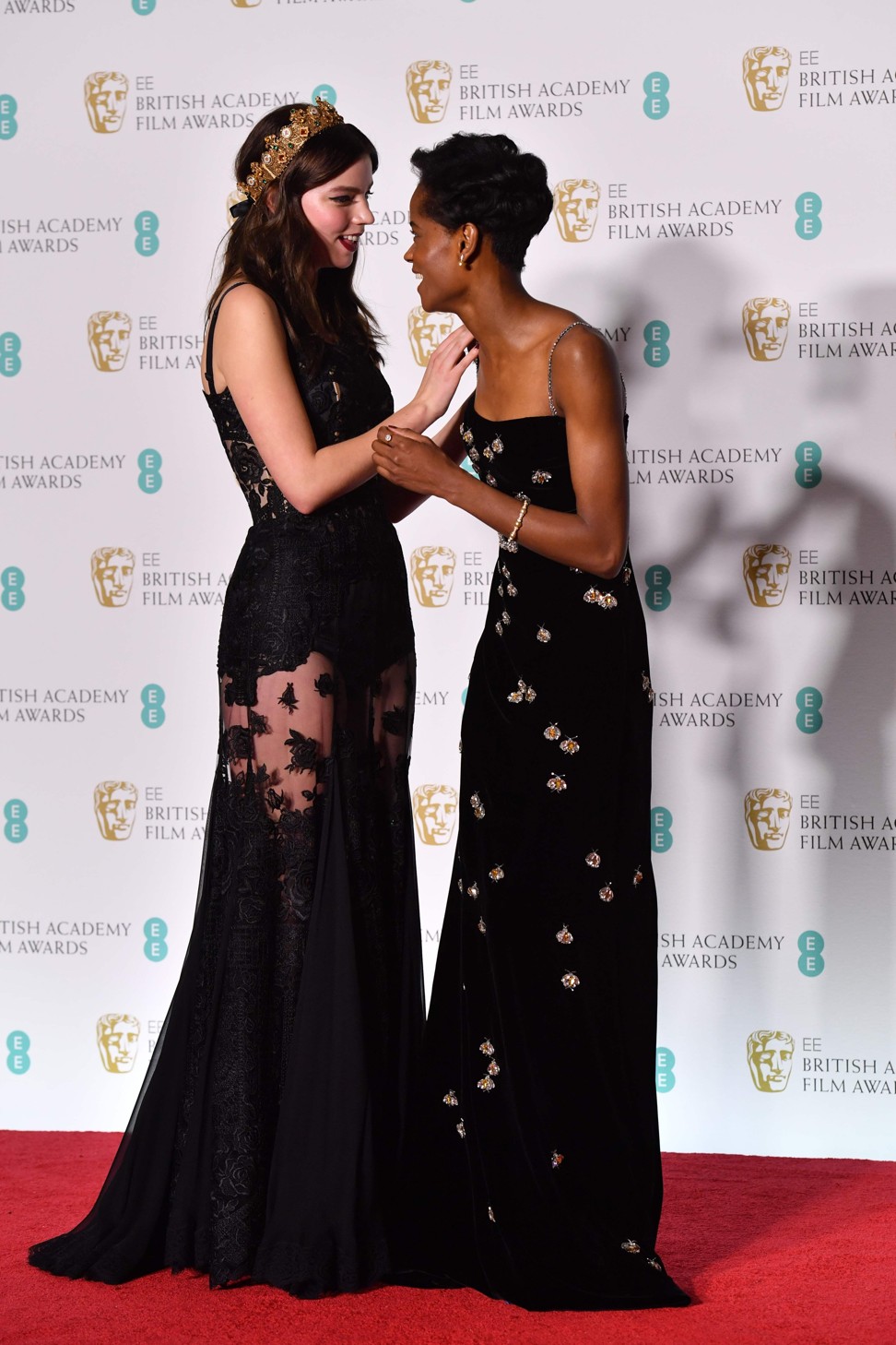 US actress Anya Taylor Joy (left, star of ‘Split’) and Guyanese actress Letitia Wright (right, of ‘Black Panther’ fame) pose in the press room after presenting an award at the Baftas. Photo: AFP