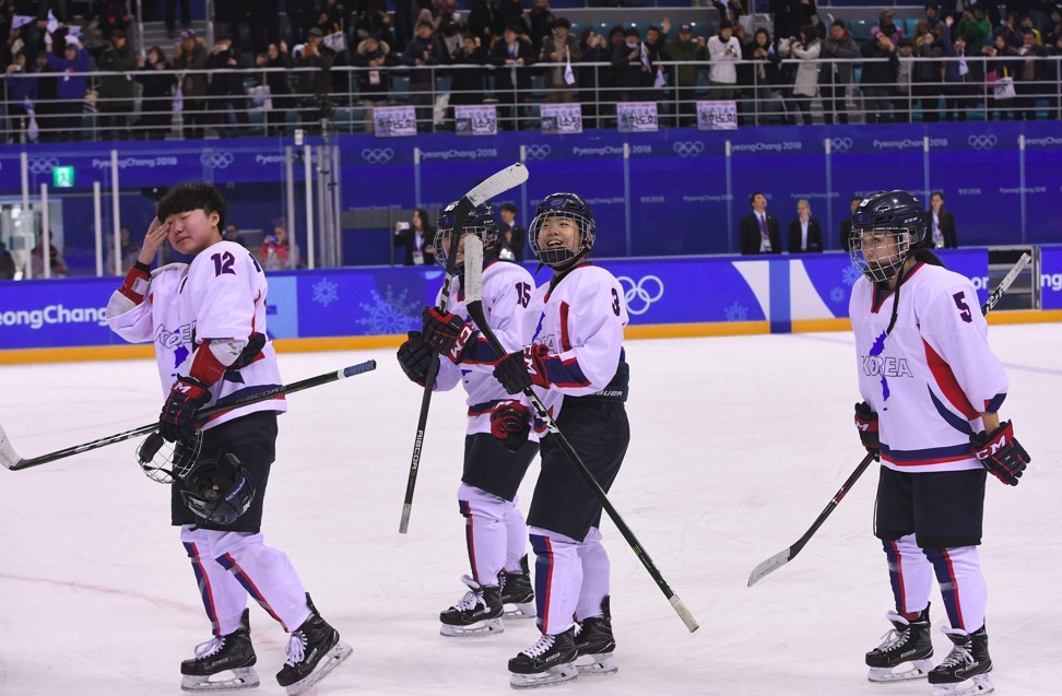 The unified Korea players wave to the crowd after their Olympics ends. Photo: AFP
