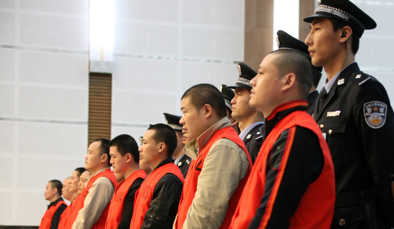 Members of a criminal gang go on trial in Chongqing in 2009. Photo: Xinhua