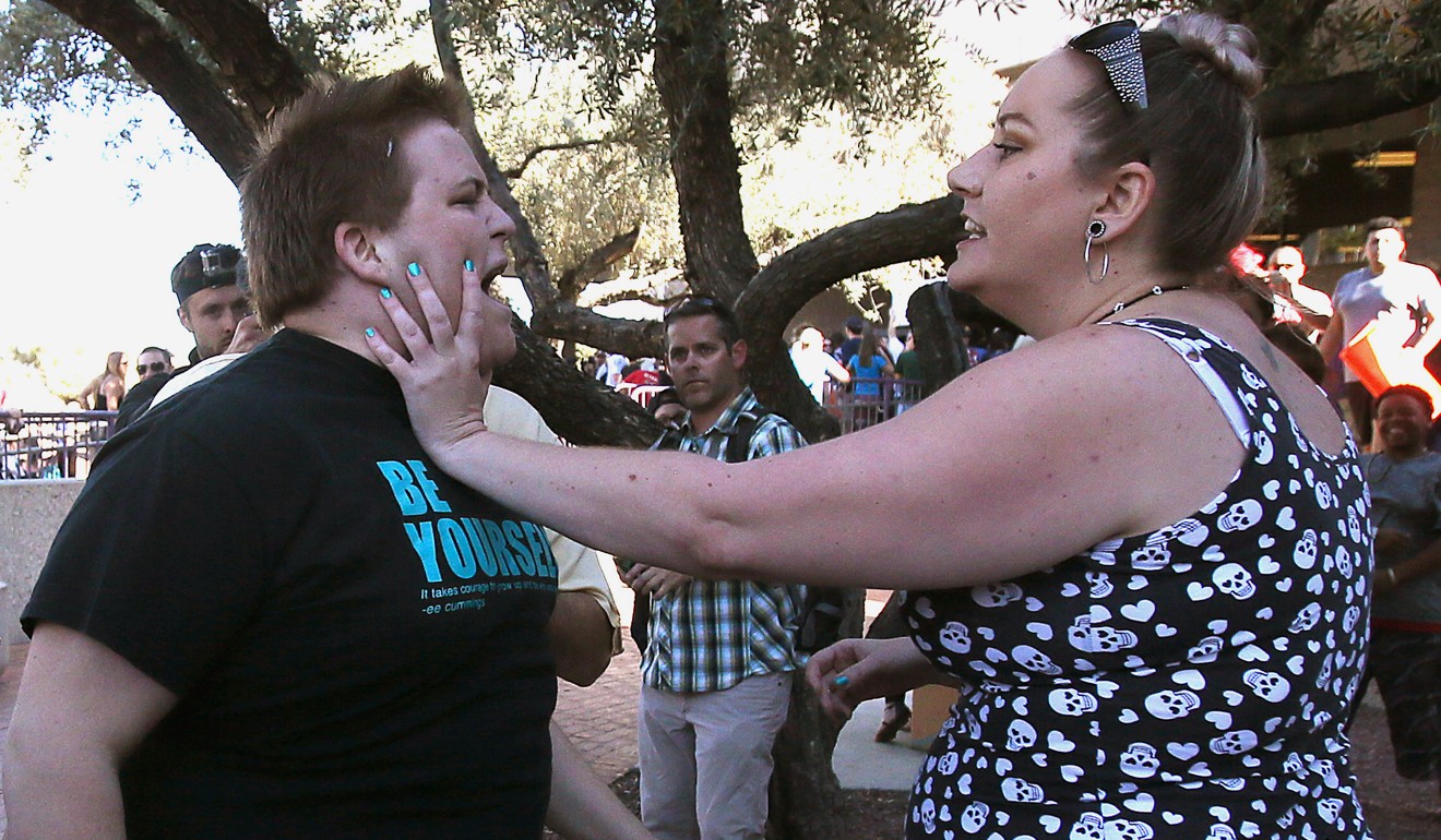 A Donald Trump protester and supporter get into an altercation after an election rally in Arizona in 2016. Chua believes her country is beginning to display the destructive political dynamics typical of developing countries. Photo: Mamta Popat/Arizona Daily Star/AP