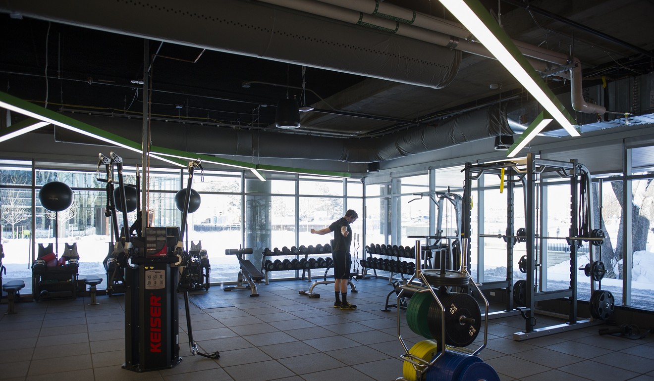 An employee works out in the gym of the new Google campus. Photo: Bloomberg