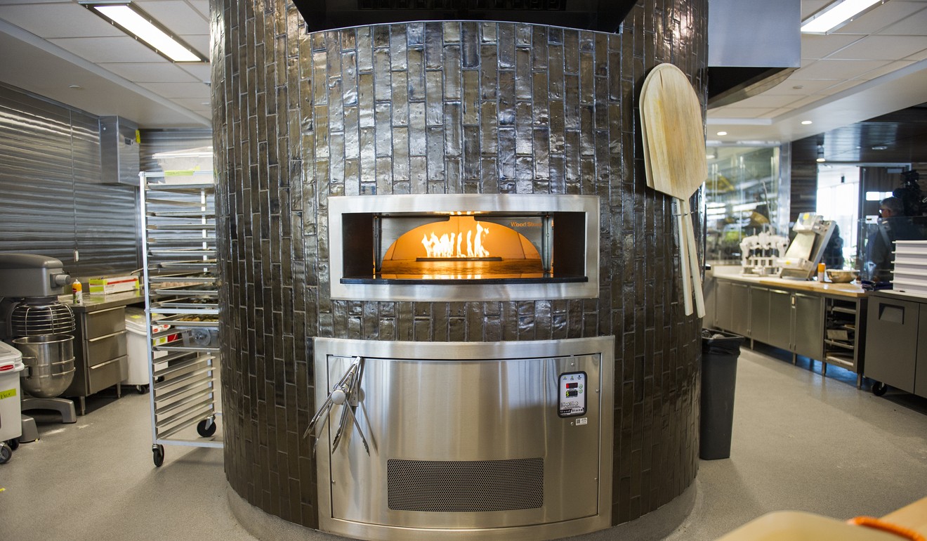 A pizza oven stands in the cafeteria of the Google campus. Photo: Bloomberg