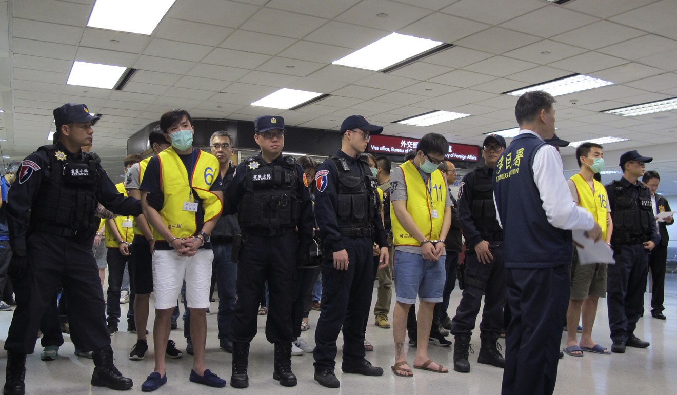 Taiwanese fraud suspects pictured after they were deported from Indonesia. Photo: Associated Press