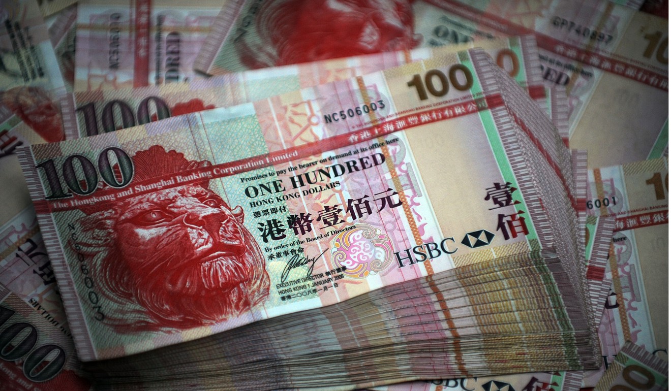 The Hong Kong dollar reversed earlier gains on Thursday before falling to a fresh 33-year low. Photo: AFP
