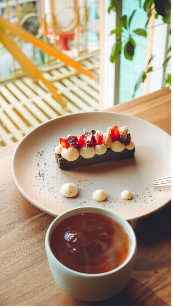 Black sesame cake and tea at Mister Jiu’s in San Francisco. Photo: Michael Weber