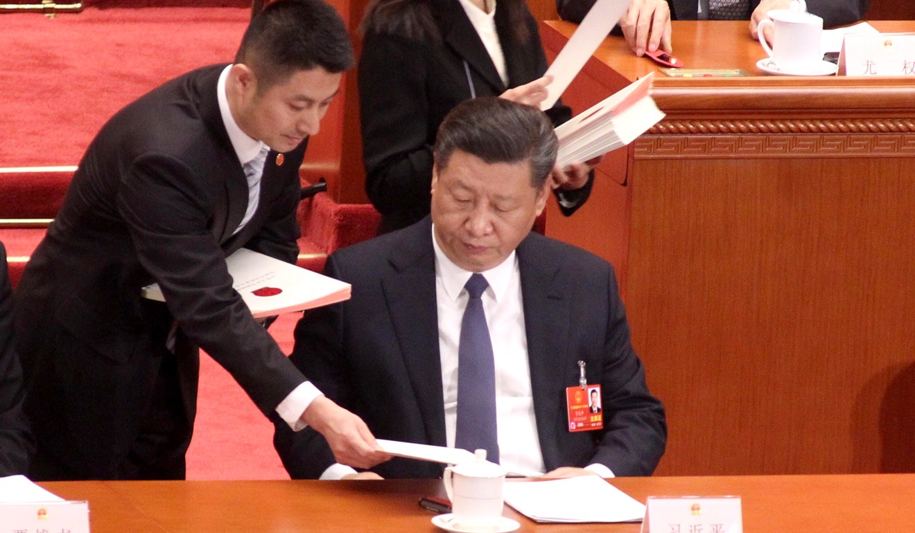 President Xi Jinping is given his ballot paper for Sunday’s vote on constitutional revisions. Photo: Simon Song