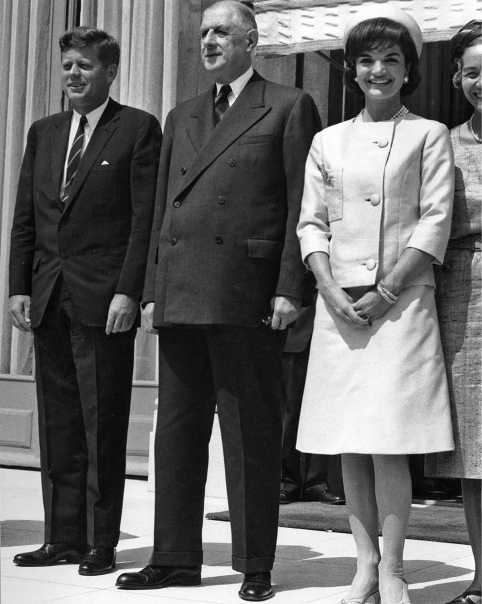 Givenchy inspired Jackie Kennedy’s iconic style - including pill-box hats such as the one she’s seen wearing here. Kennedy is pictured during a state visit to France with her husband, US President John F Kennedy (left), and French President Charles de Gaulle (centre). Photo: The John F Kennedy Presidential Library and Museum
