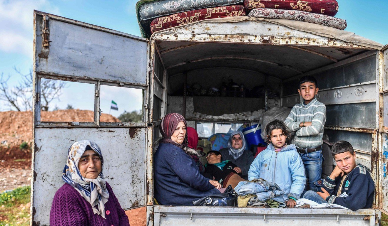 Civilians flee the city of Afrin in northern Syria. Photo: AFP