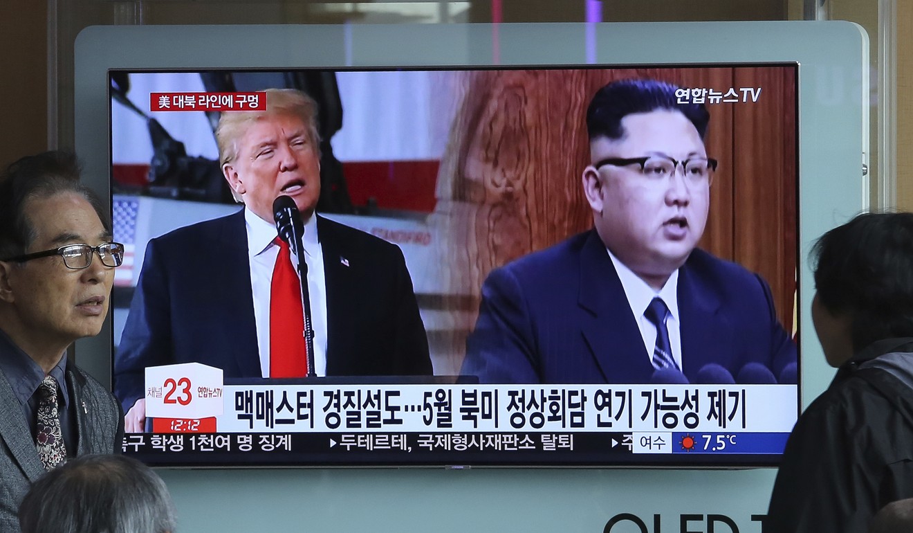 A television shows North Korean leader Kim Jong-un and US President Donald Trump during a news programme at the Seoul Railway Station in Seoul, South Korea on Saturday. Photo: AP