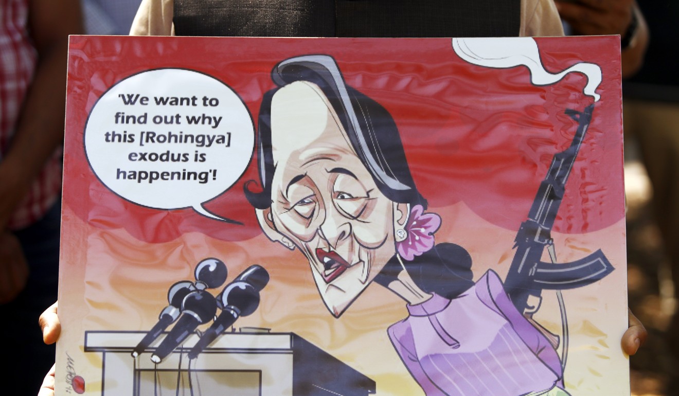 Rohingya supporters protest against Aung San Suu Kyi as she visits Australia to attend the Asean Special Summit 2018, in Sydney. Photo: EPA