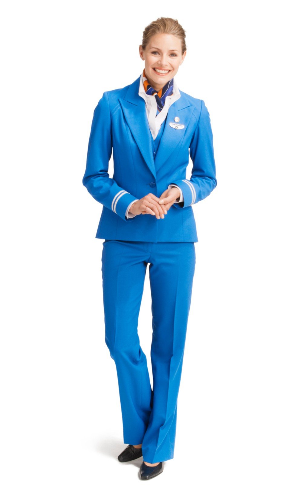 A KLM flight attendant wearing trousers – a uniform option since 2010. 