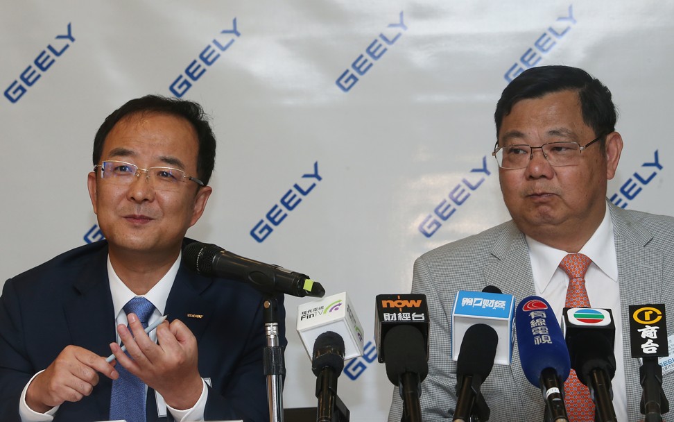 An Conghui (Left), Executive Director of Geely Automobile Holdings Ltd. and Gui Shengyue, CEO & Executive Director attend Geely Automobile Holdings Ltd. 2017 interim results in Wan Chai on 16 August 2017. Photo: SCMP/David Wong