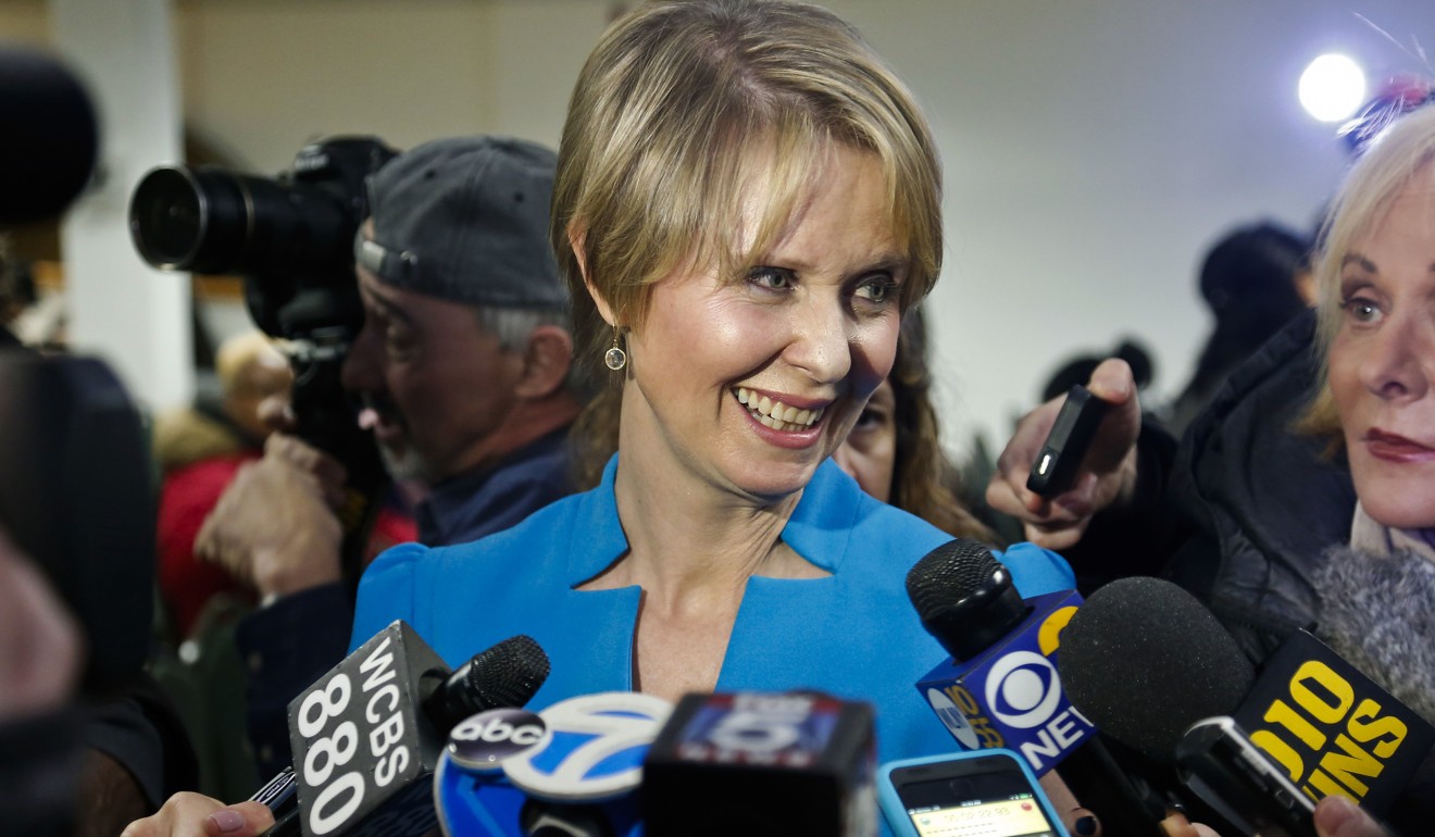 Cynthia Nixon speaks with reporters at her first campaign stop on March 20, 2018, in the Brownsville section of Brooklyn, New York. Nixon will challenge New York Governor Andrew Cuomo for the Democratic nomination. Photo: AP