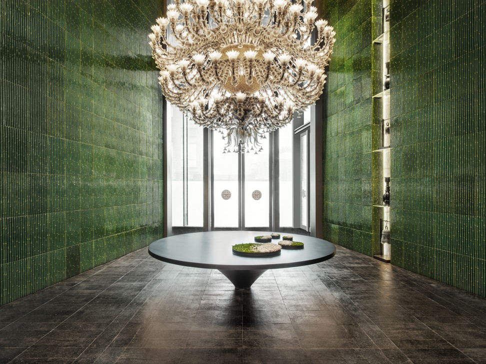 The six-metre-high chandelier in the lobby comprises 3,760 pieces of glass and was made by Venetian glass master Fabiano Zanchi. Photo: Michael Weber