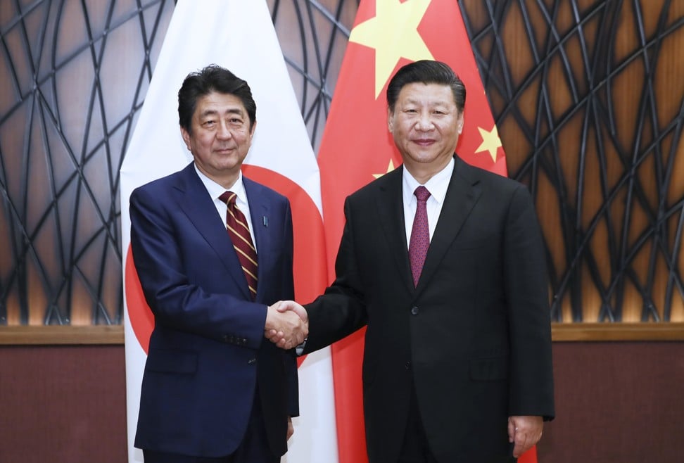 Chinese President Xi Jinping (right) met Japanese Prime Minister Shinzo Abe on the fringes of the Asia-Pacific Economic Cooperation summit in Vietnam in November. Photo: Xinhua