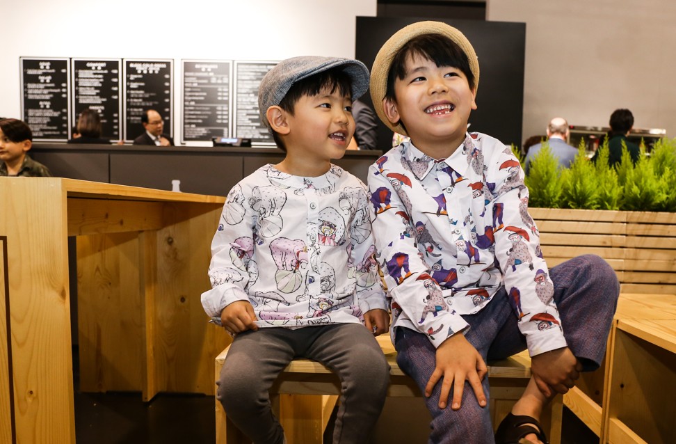 Brothers in coordinated outfits at the fair. Photo: Rachel Cheung