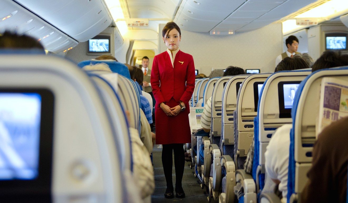 Cathay Pacific’s female staff win right to wear trousers in historic ...