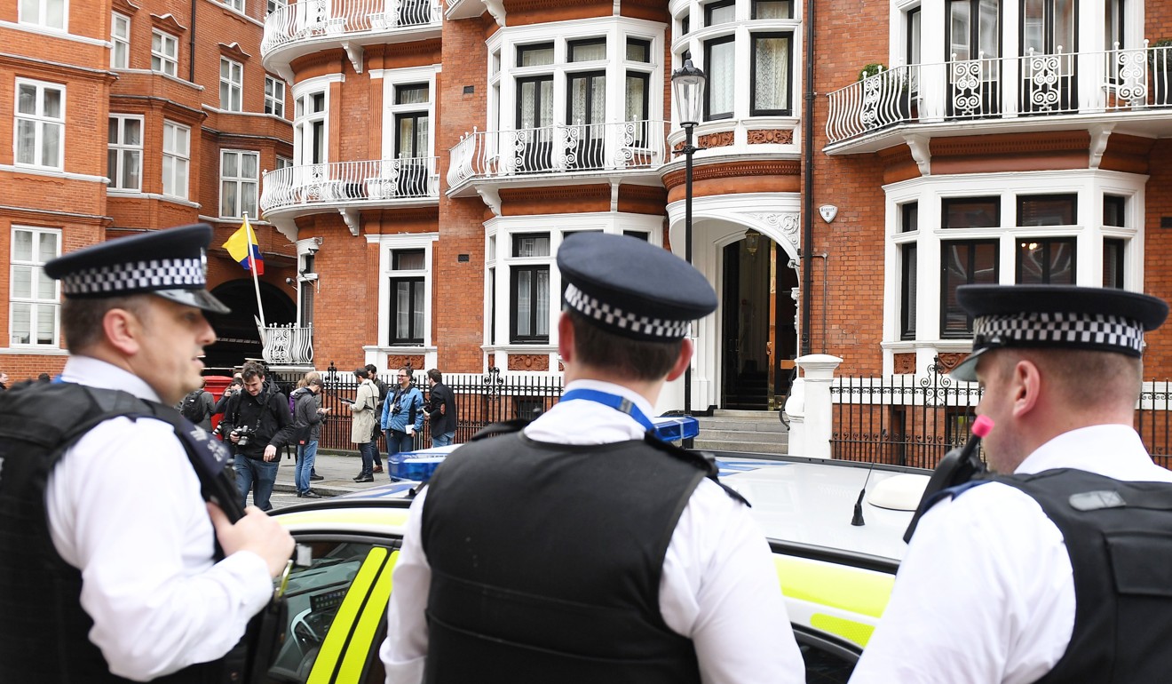 Police outside the Ecuadorean embassy where Julian Assange is staying in London on May 19, 2017. Photo: EPA