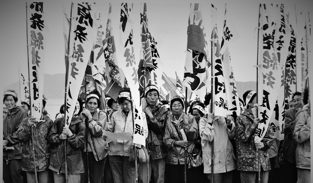 The wives of fishermen on Iwaishima protest against the Kaminoseki nuclear power plant project. Photo: Keiko Nasu