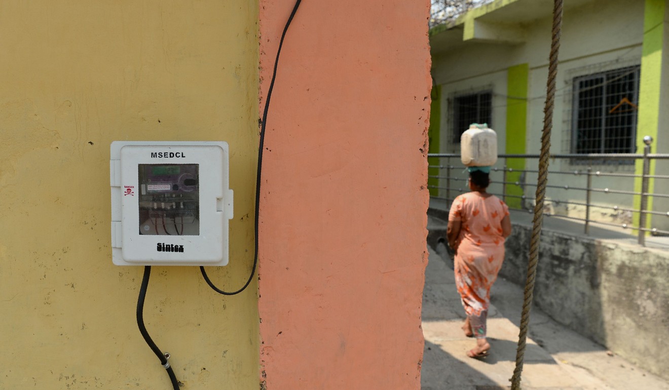An electricity supply metering board on the wall of a village house. Photo: APF