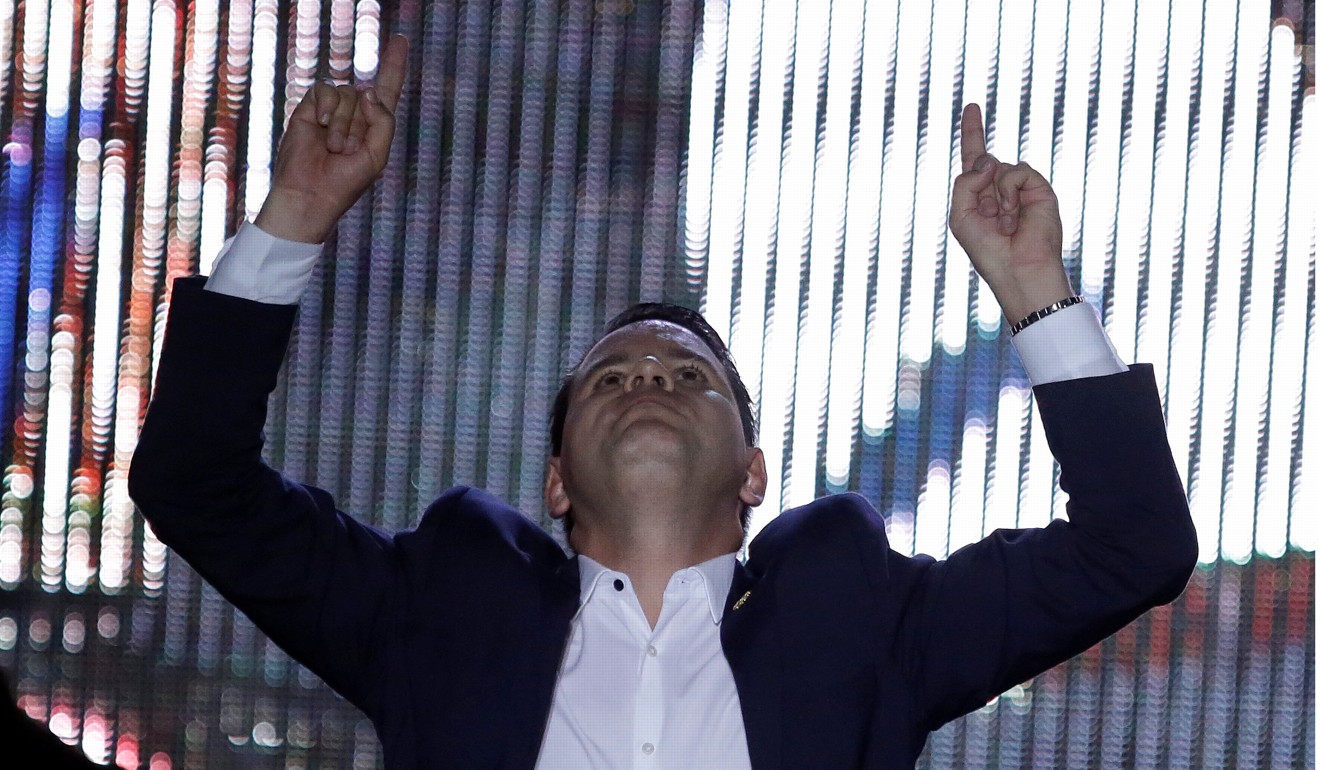 Fabricio Alvarado Munoz, the defeated presidential candidate of the National Restoration party (PRN), gestures during a rally after the official election results were released in San Jose on Sunday. Photo: Reuters