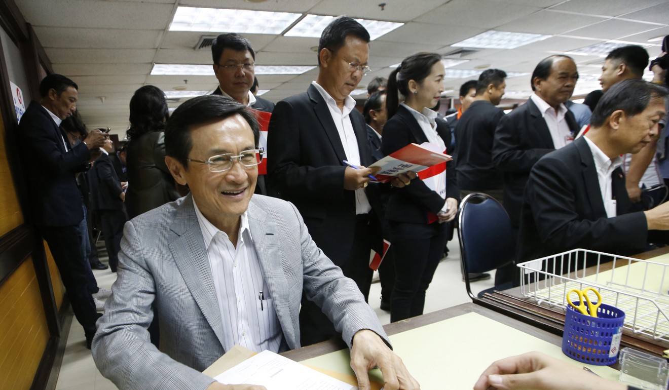 Thai former lawmaker Chaturon Chaisaeng registers his membership to Pheu Thai Party in Bangkok. Photo: AP