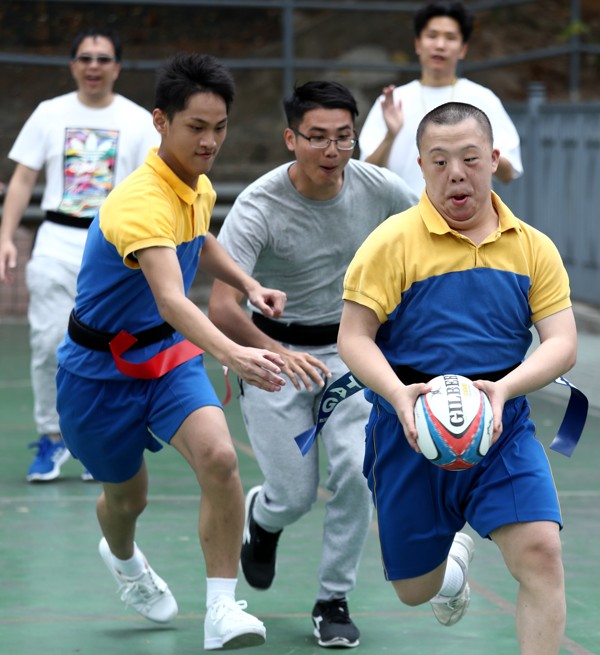 Harbour Ho (front), a pupil at Po Leung Kuk Anita LL Chan (Centenary) School, at rugby practice. Photo: Nora Tam