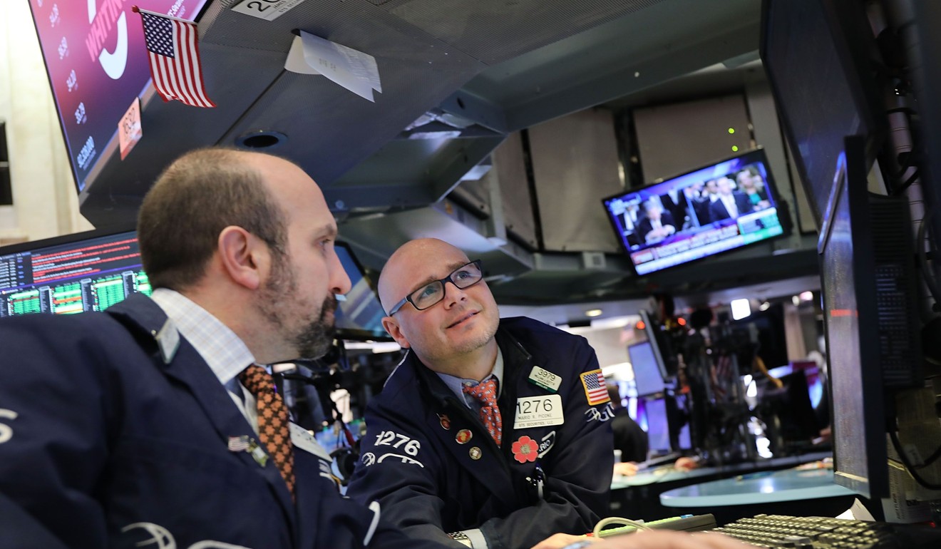 Traders on the floor of the New York Stock Exchange. China made statements that defused trade tensions between Beijing and Washington, causing the markets to move up. Photo: AFP