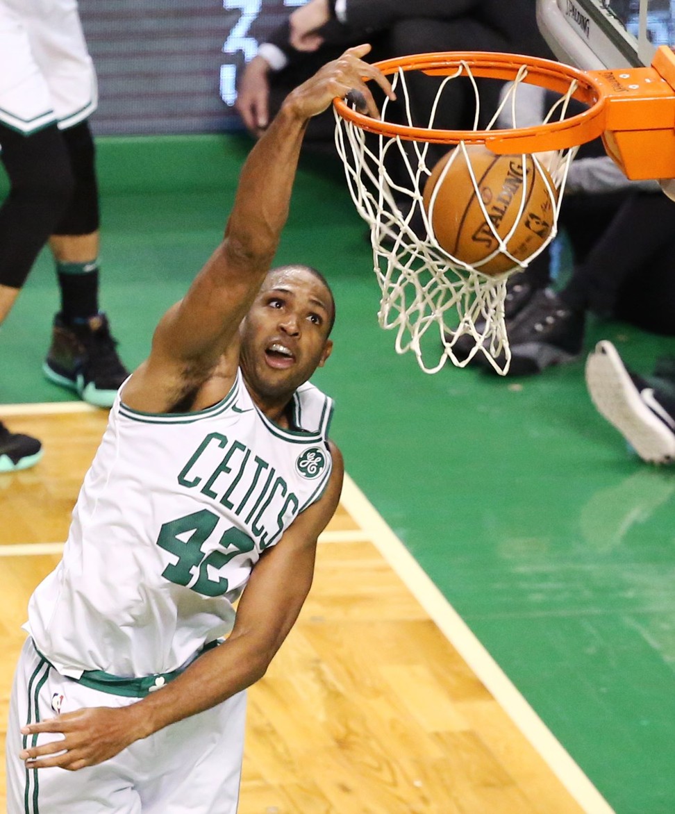 Al Horford of the Boston Celtics dunks during the fourth quarter against the Milwaukee Bucks. Photo: AFP