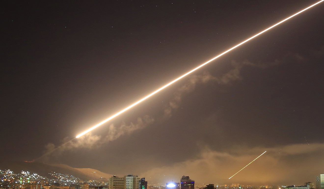 Damascus skies erupt with surface-to-air missile fire as the US launches an attack on Syria on Saturday, in response to an alleged chemical attack. Photo: AP