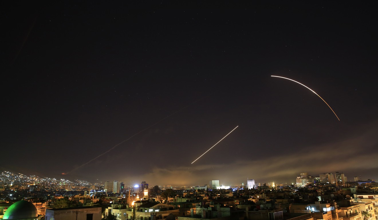 Missiles streak across the Damascus skyline as the US launches an attack on Syria targeting different parts of the capital, early on Saturday. Syria's capital has been rocked by loud explosions that lit up the sky with heavy smoke as U.S. President Donald Trump announced airstrikes in retaliation for the country's alleged use of chemical weapons. Photo: AP