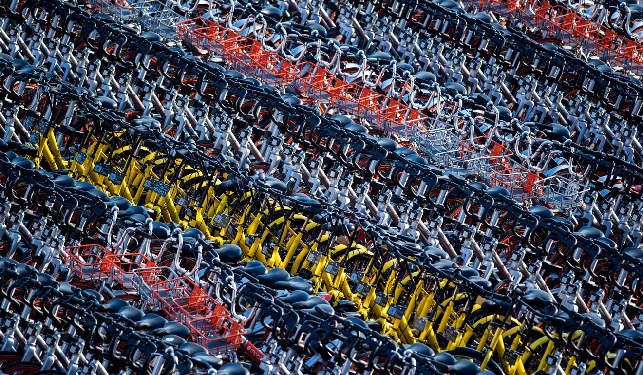 Impounded cycles from bike-sharing companies Mobike and Ofo in Shanghai in 2017. Bike-sharing has recently taken off in China. Photo: AFP