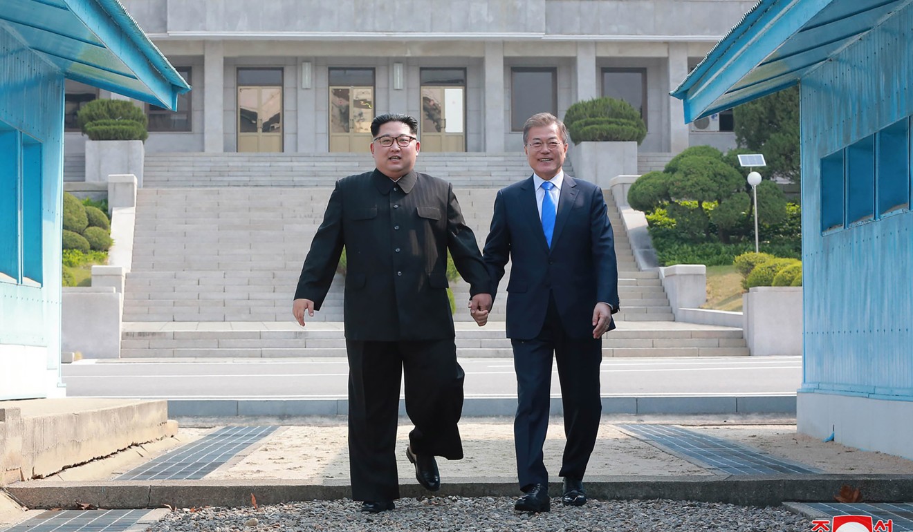 North Korean leader Kim Jong-un (left) walking with South Korean President Moon Jae-in to the official summit Peace House building for their meeting on the southern side of the truce village of Panmunjom. This picture was taken on April 27 and released from North Korea's Korean Central News Agency (KCNA) on April 29. Photo: AFP / KCNA via KNS