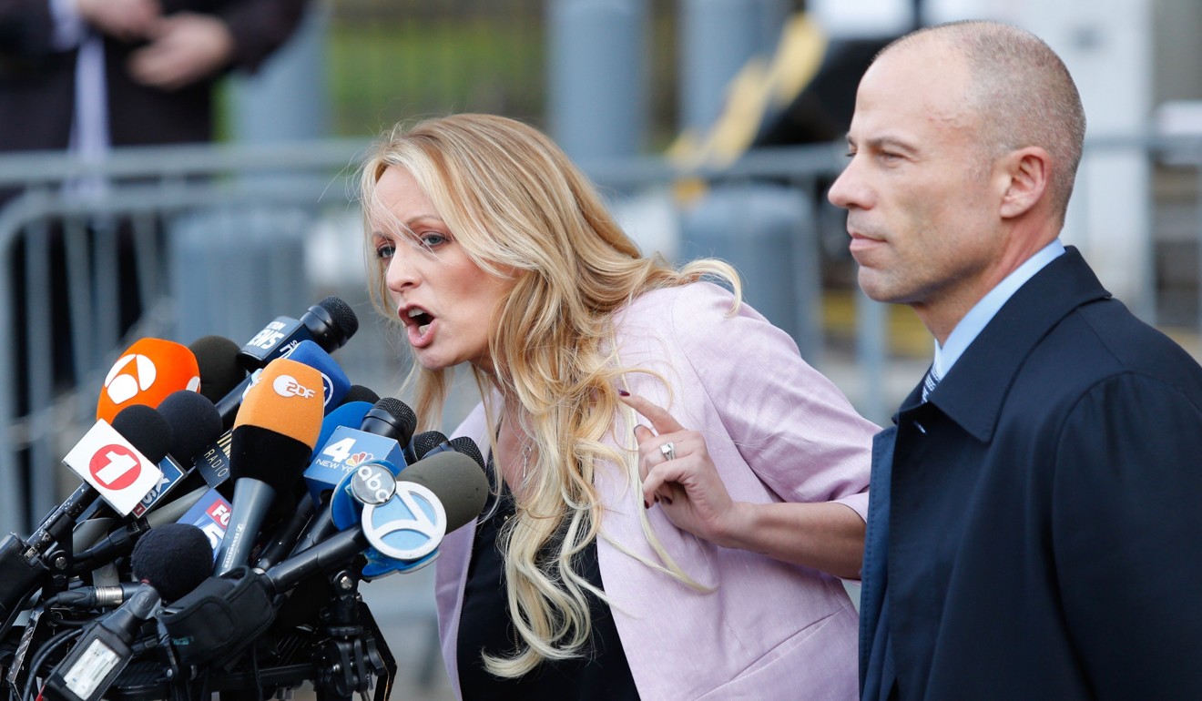 Porn star Stormy Daniels, real name Stephanie Clifford, speaks to press with her lawyer Michael Avenatti on April 16in Lower Manhattan, New York. Photo: AFP