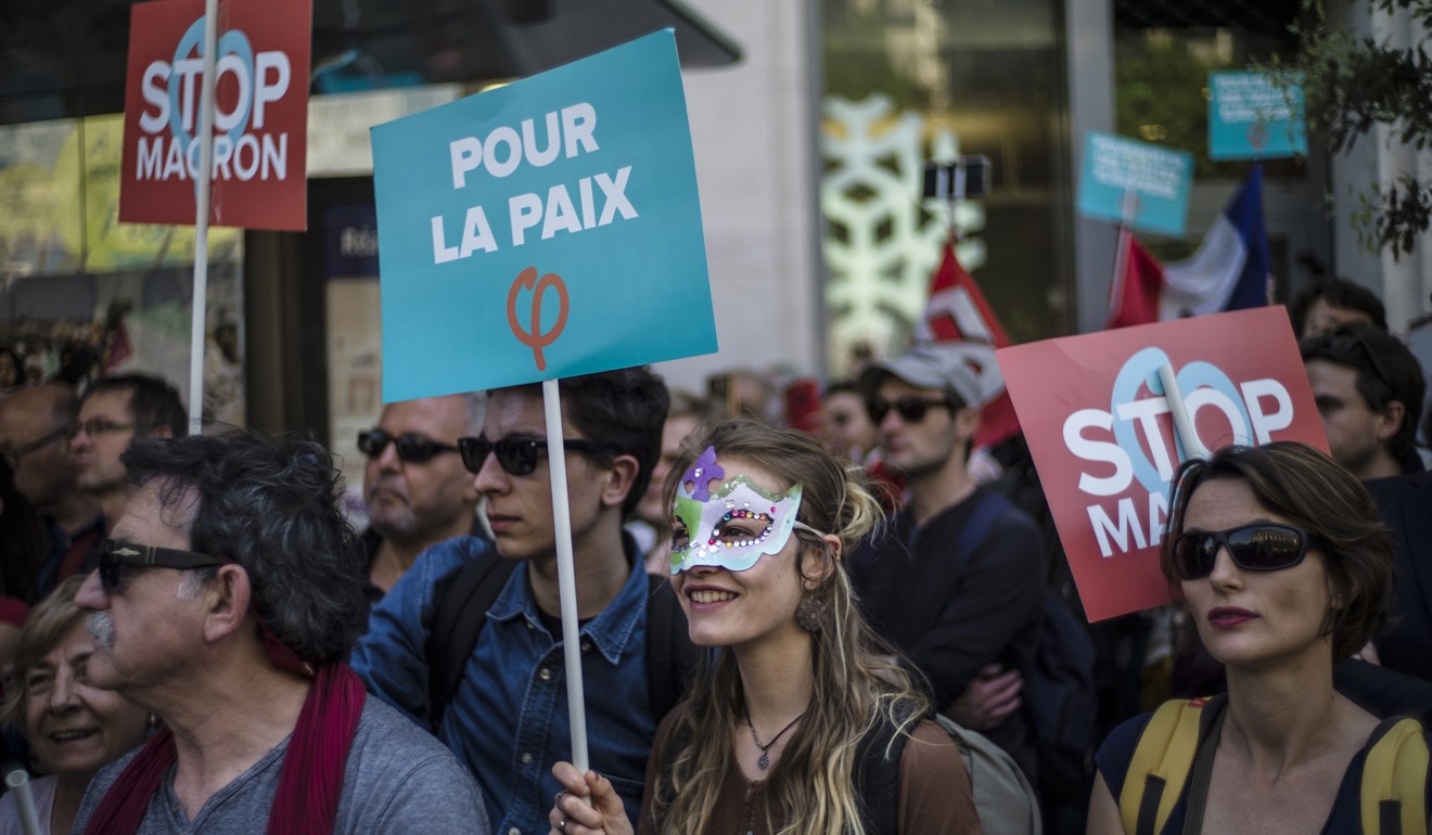 Protesters gather during a demonstration against the policies of French President Emmanuel Macron on Saturday. Photo: EPA-EFE