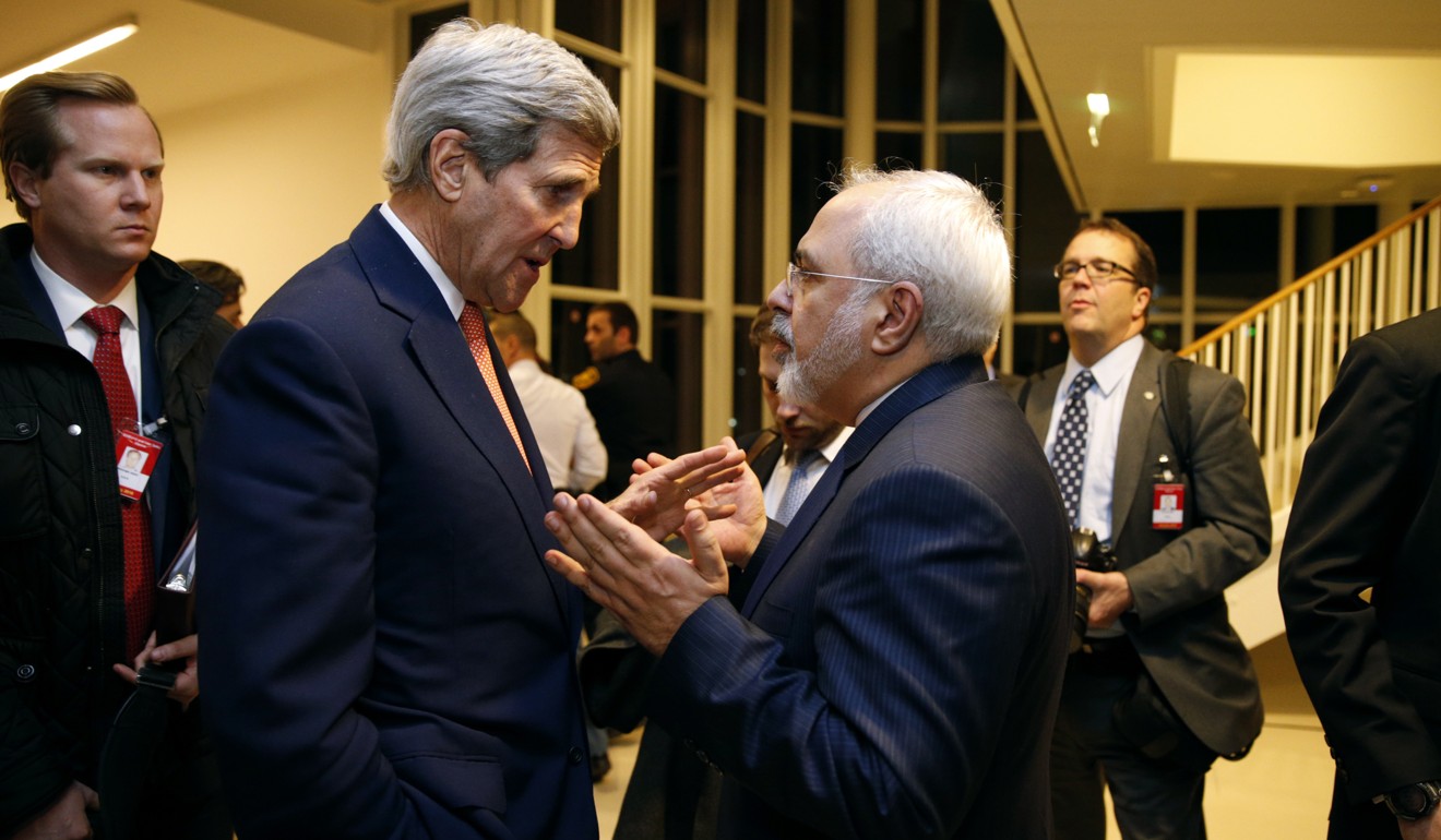 Former Secretary of State John Kerry (seen on January 16, 2016, with with Iranian Foreign Minister Mohammad Javad Zarif in Vienna) has been involved in the recent negotiations to help maintain the deal. Photo: pool via AP