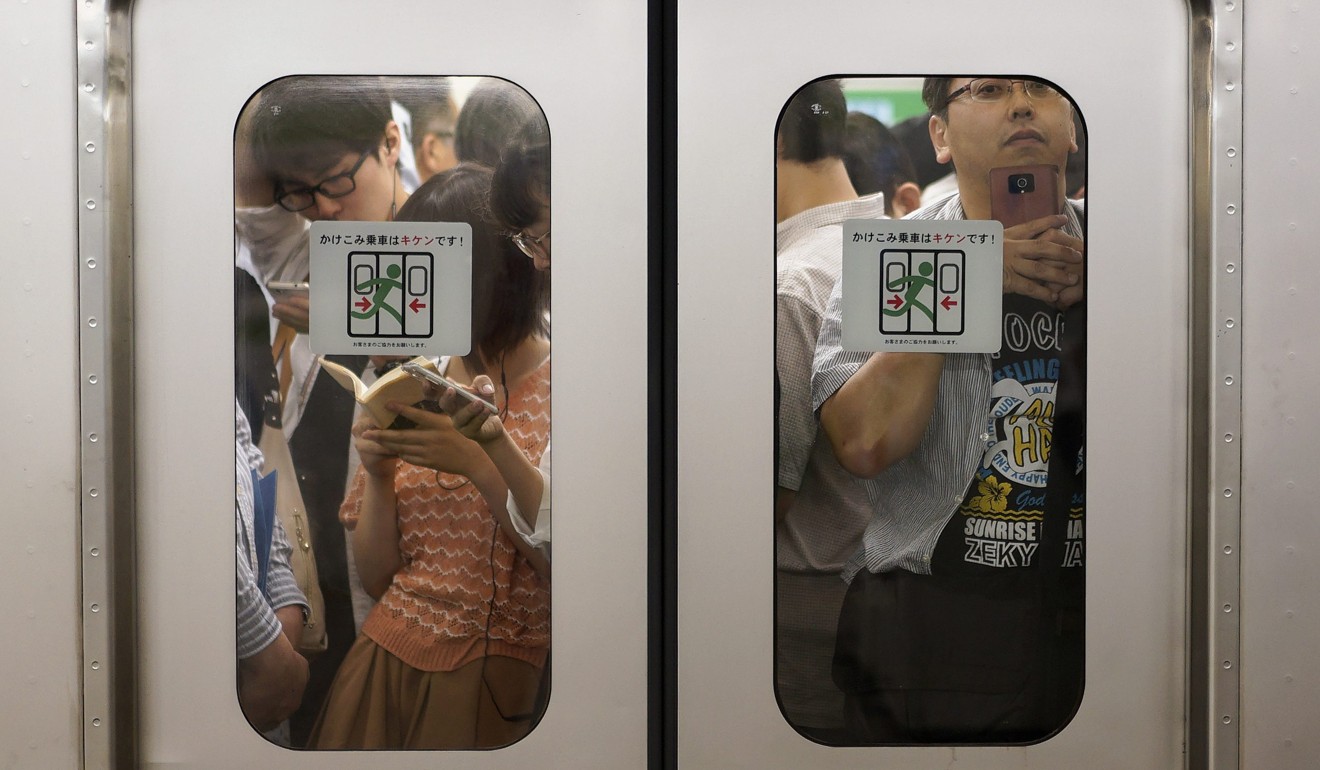 Tokyo’s rush-hour commutes are already infamous for trains crammed full of passengers. File photo: EPA