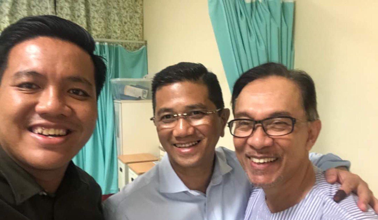 Anwar watched Mahathir’s swearing-in ceremony with two long time loyalists Azmin Ali and Afif Bahardin. He is currently recuperating from a surgery at Cheras Hospital in the capital Kuala Lumpur.