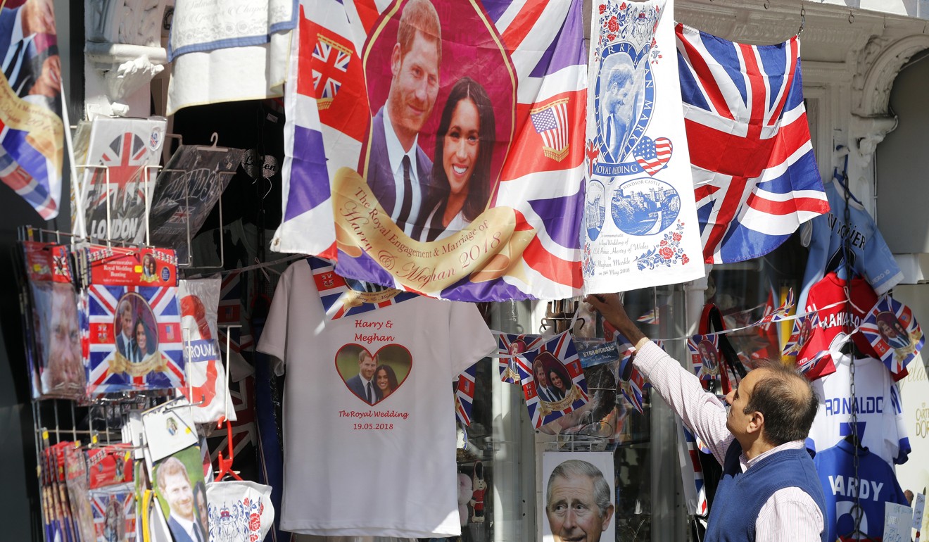 A man browses at a souvenir shop in Windsor, England, on Tuesday. Photo: AP 