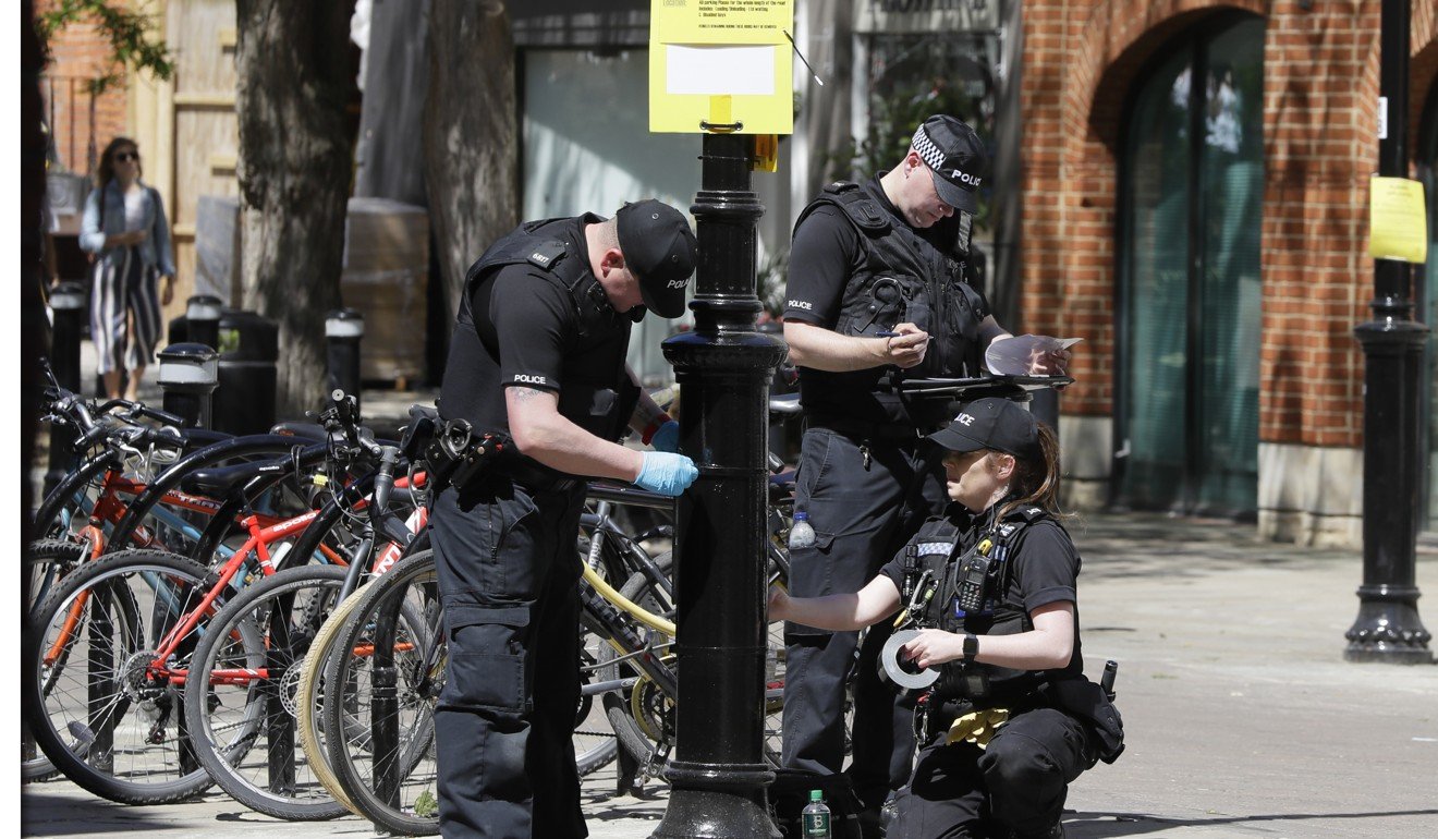 Police officers do security checks in Windsor on Monday. Photo: AP