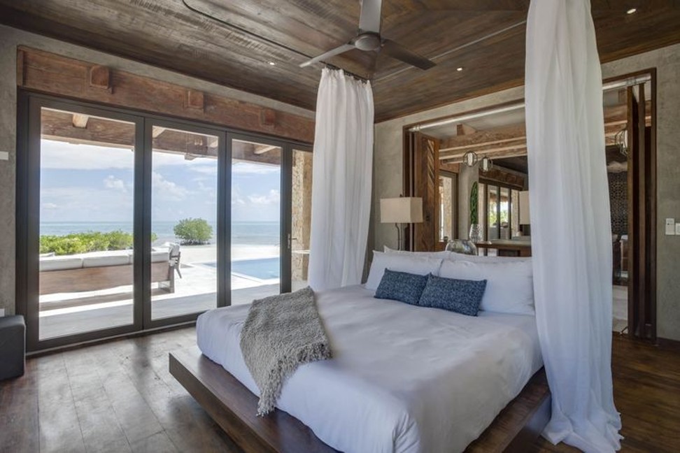 One of the suite’s two bedrooms at Gladden Private Island. Photo: Gladden Private Island