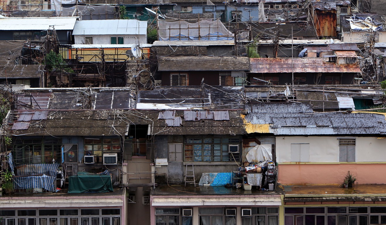 Many Hongkongers live in illegal structures on the rooftops of residential high-rises. Photo: Jonathan Wong