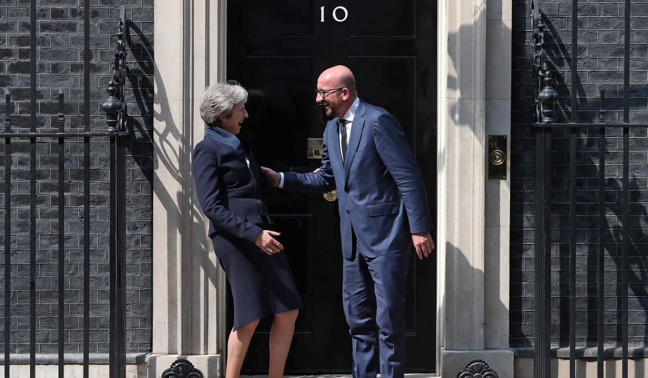 Another awkward moment for British Prime Minister Theresa May as she greets Belgian Prime Minister Charles Michel somewhat effusively outside 10 Downing Street last month. Photo: AFP