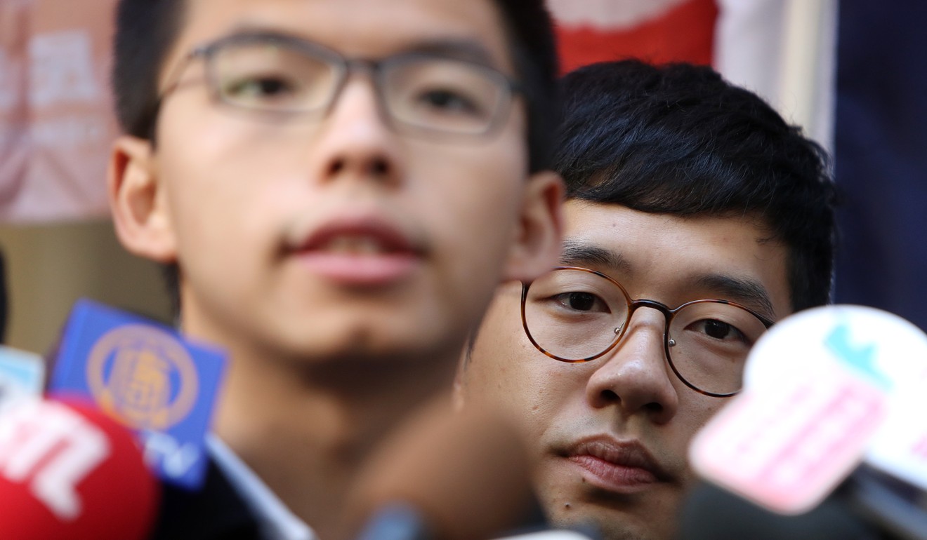 Former student leaders Joshua Wong (left) and Nathan Law. Law was elected to Legco in 2016, but was later disqualified following his controversial oath-taking. Photo: Winson Wong